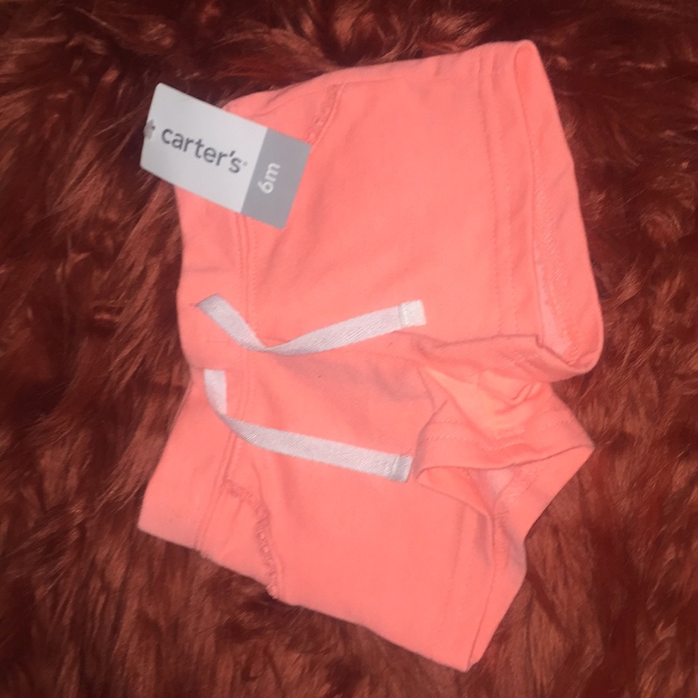 (NWT) Coral colored Carter’s shorts size 6 months